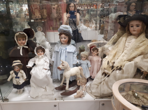 Liliya Dashevski photographing dolls at the Museum of Unique Dolls in Moscow.