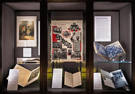 “Subjects and Objects: Slavic Collections at Yale, 1896-2022,” an exhibit at Sterling Memorial Library, explores how Yale’s Slavic collections were built. The case pictured here features materials the governments of the Russian Empire and Soviet Union used to consolidate their power over vast land areas. (Photos by Andrew Hurley)